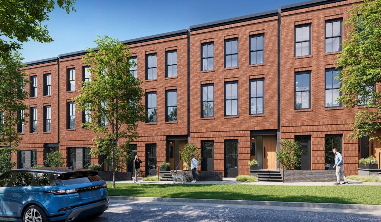 Street view of brick townhomes at Lewter District development in downtown Huntsville Alabama