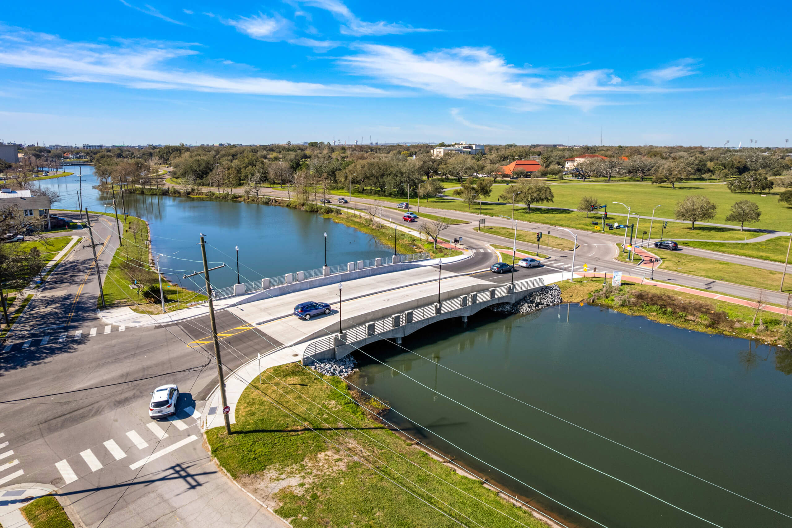 Aerial photo of Desaix Bridge with New Orleans skyline in the background.