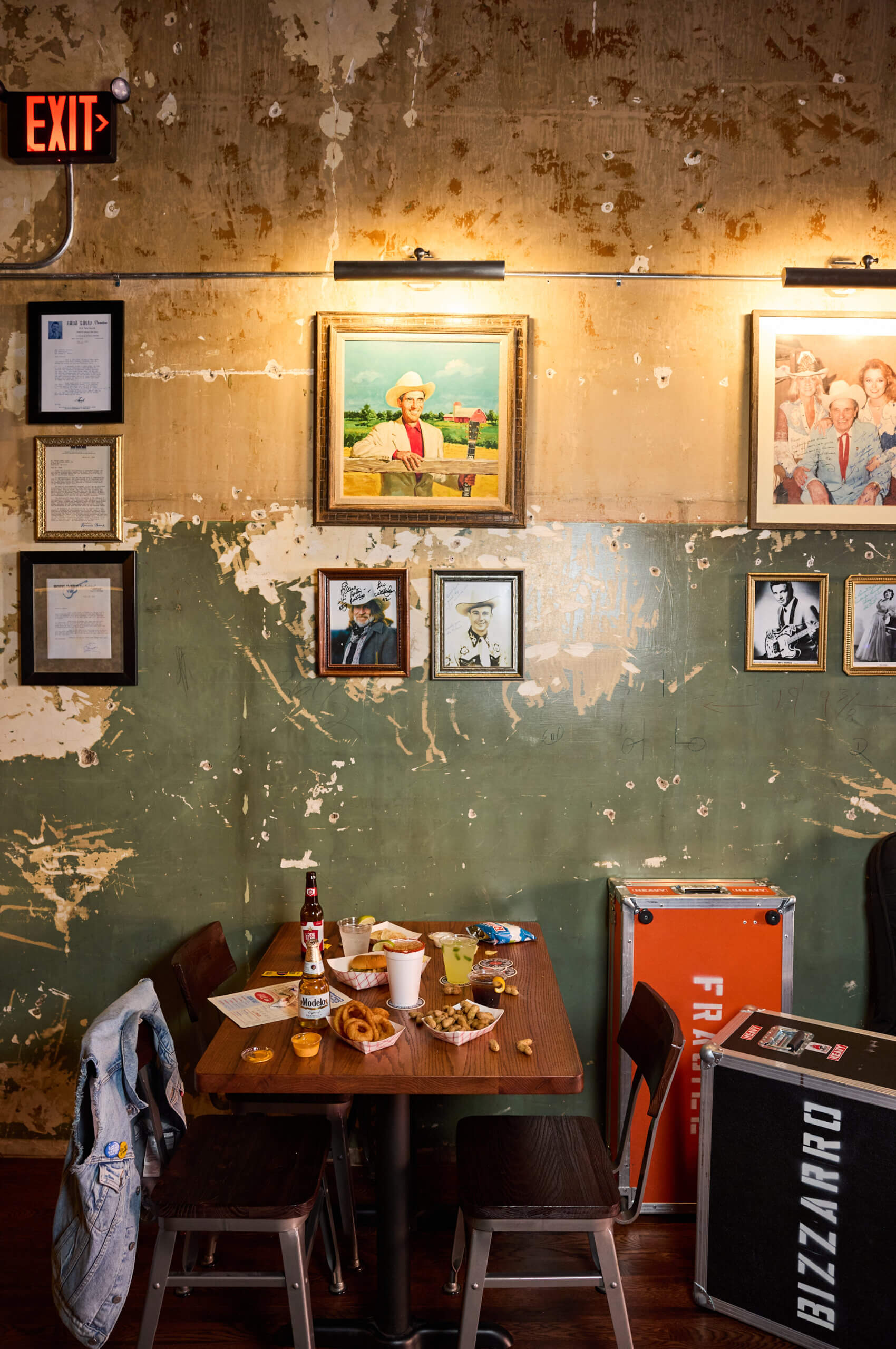 Framed historic photos displayed inside Ernest Tubb Record Shop