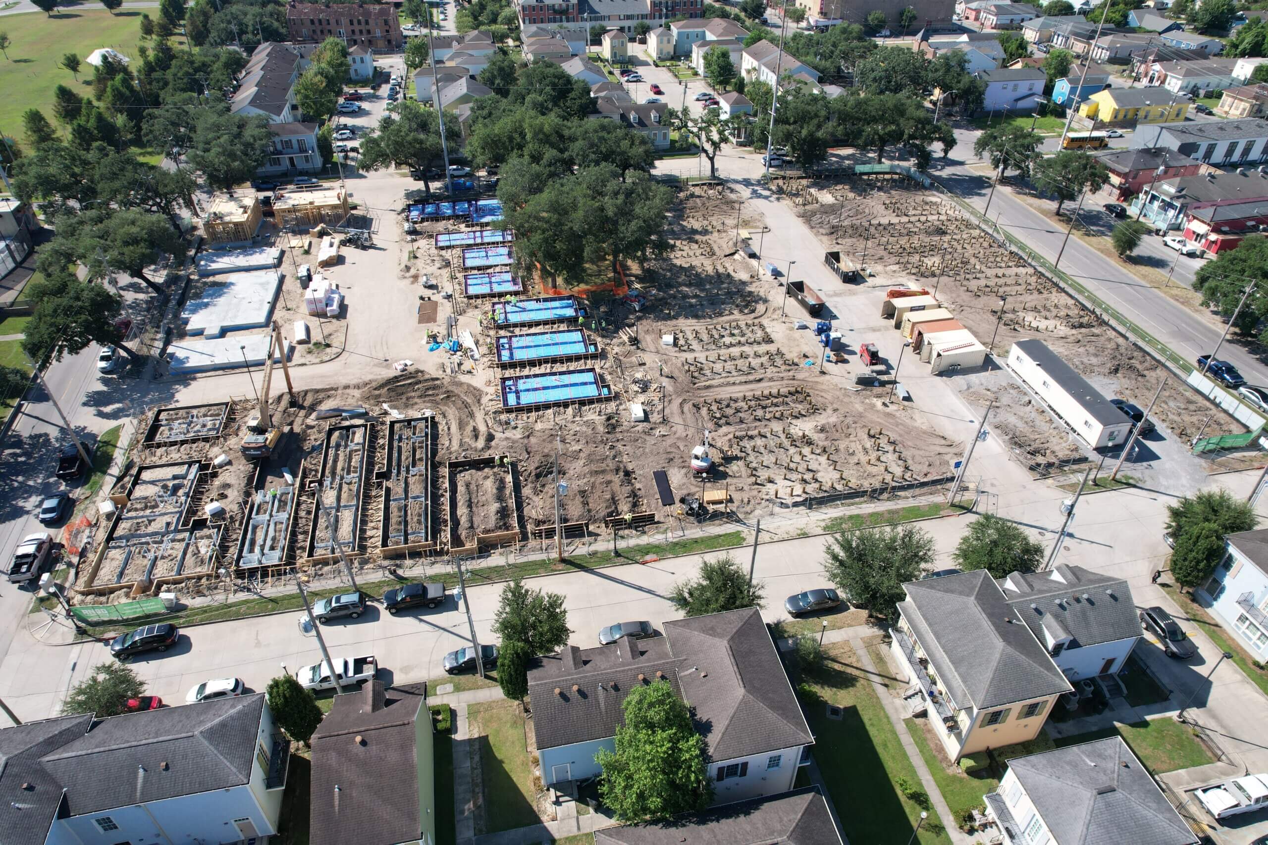 Aerial view of Lafitte Phase VII construction showing foundations, pilings, and site development in progress