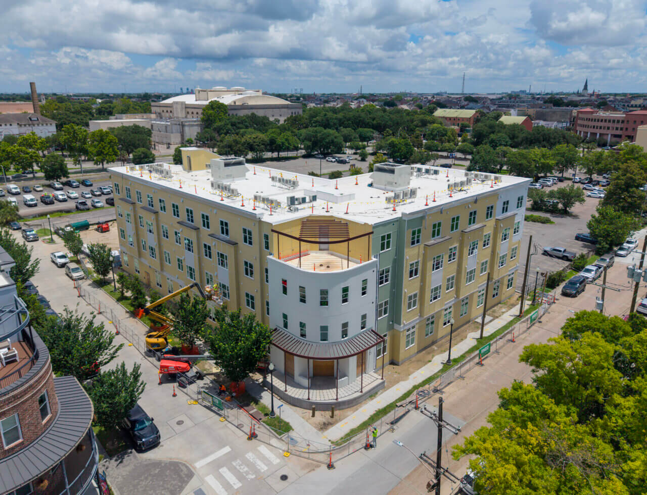Four-story Winn-Dixie Phase II building with completed exterior façade and roof systems