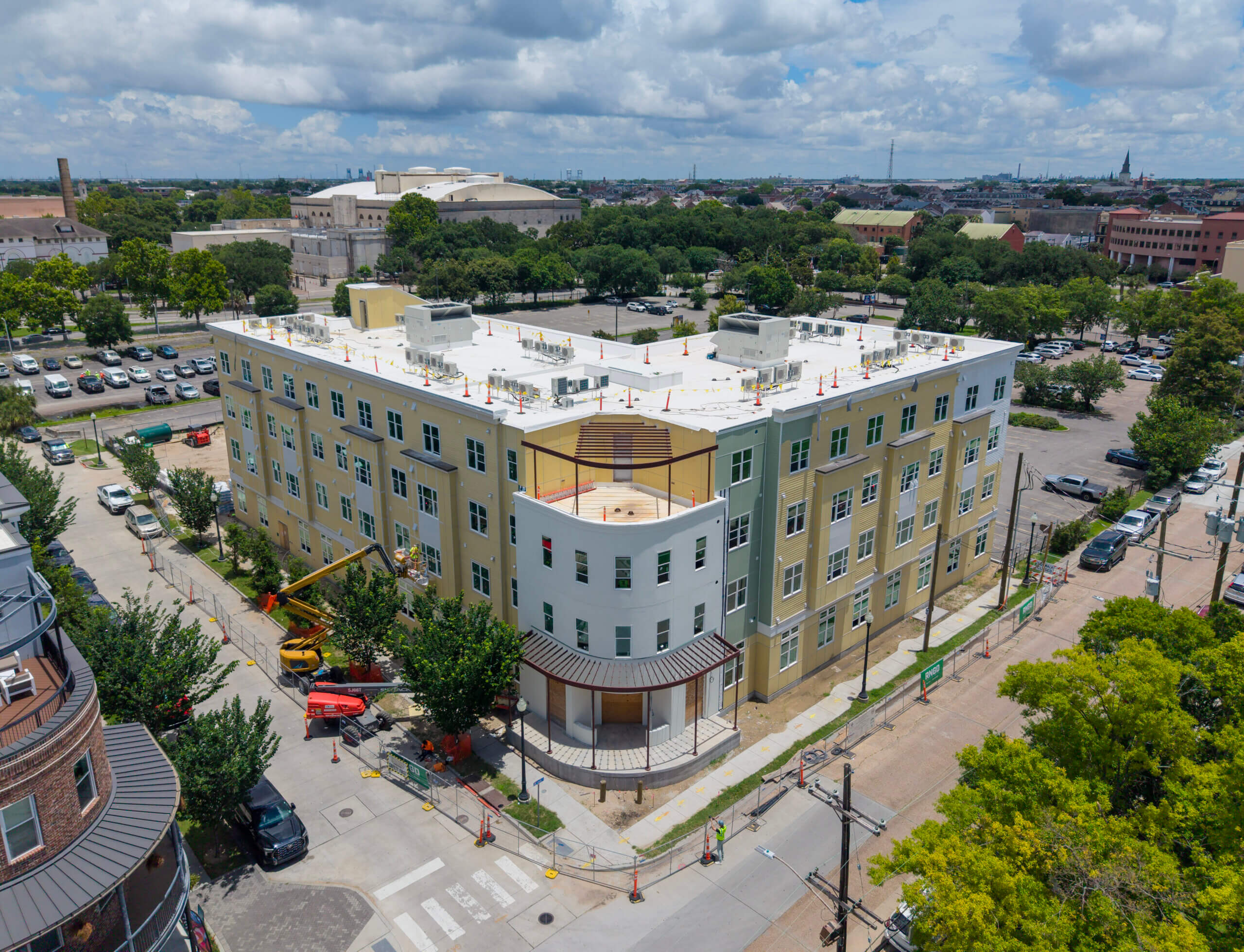 Four-story Winn-Dixie Phase II building with completed exterior façade and roof systems
